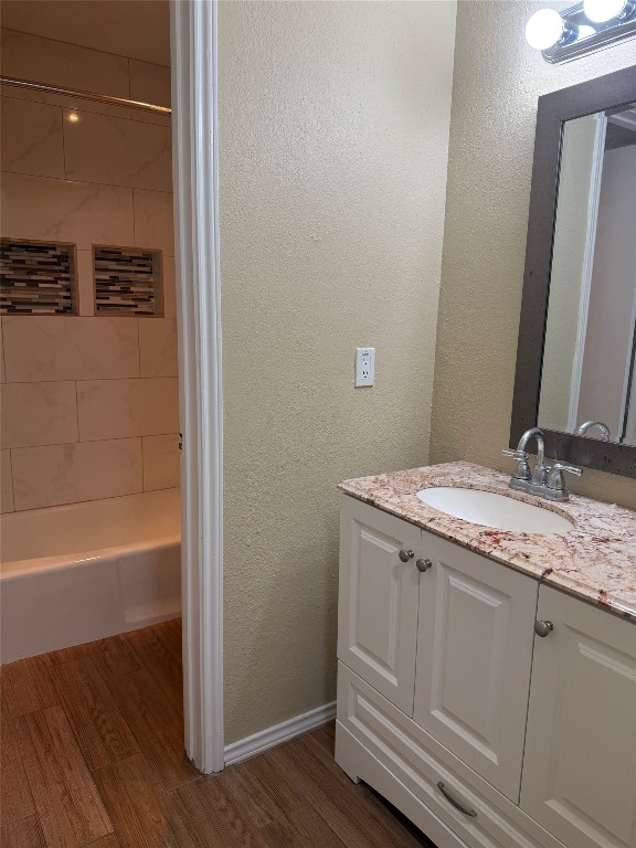 1808 Rio Grande Street, Unit 3 Austin, TX 78701 - Photo 14 of 29 a bathroom with a granite countertop sink and a mirror