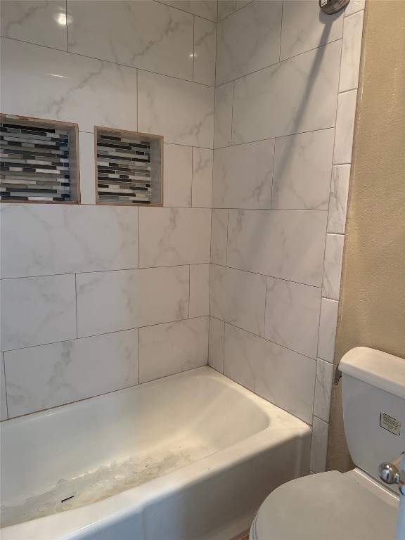 1808 Rio Grande Street, Unit 3 Austin, TX 78701 - Photo 15 of 29 a bathroom with a toilet and a shower