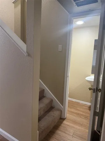 a bathroom with a sink and a toilet