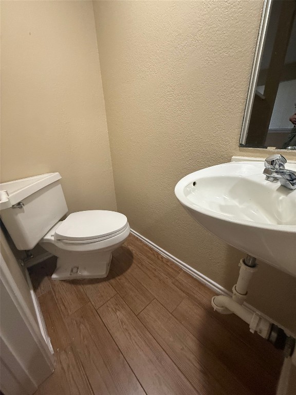 1808 Rio Grande Street, Unit 3 Austin, TX 78701 - Photo 7 of 29 a bathroom with a sink and a toilet