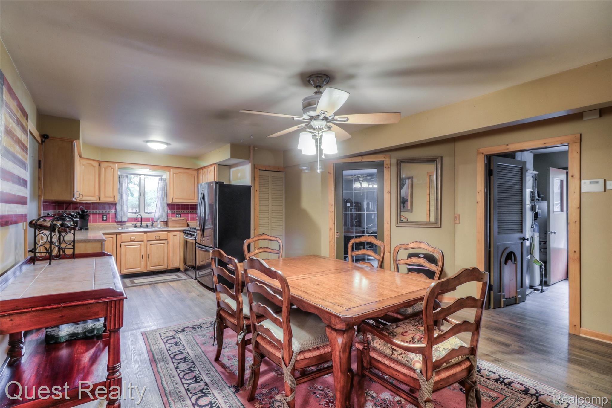 7045 Andersonville Road Clarkston, MI 48346 - Photo 25 of 36 spacious kitchen and dining area