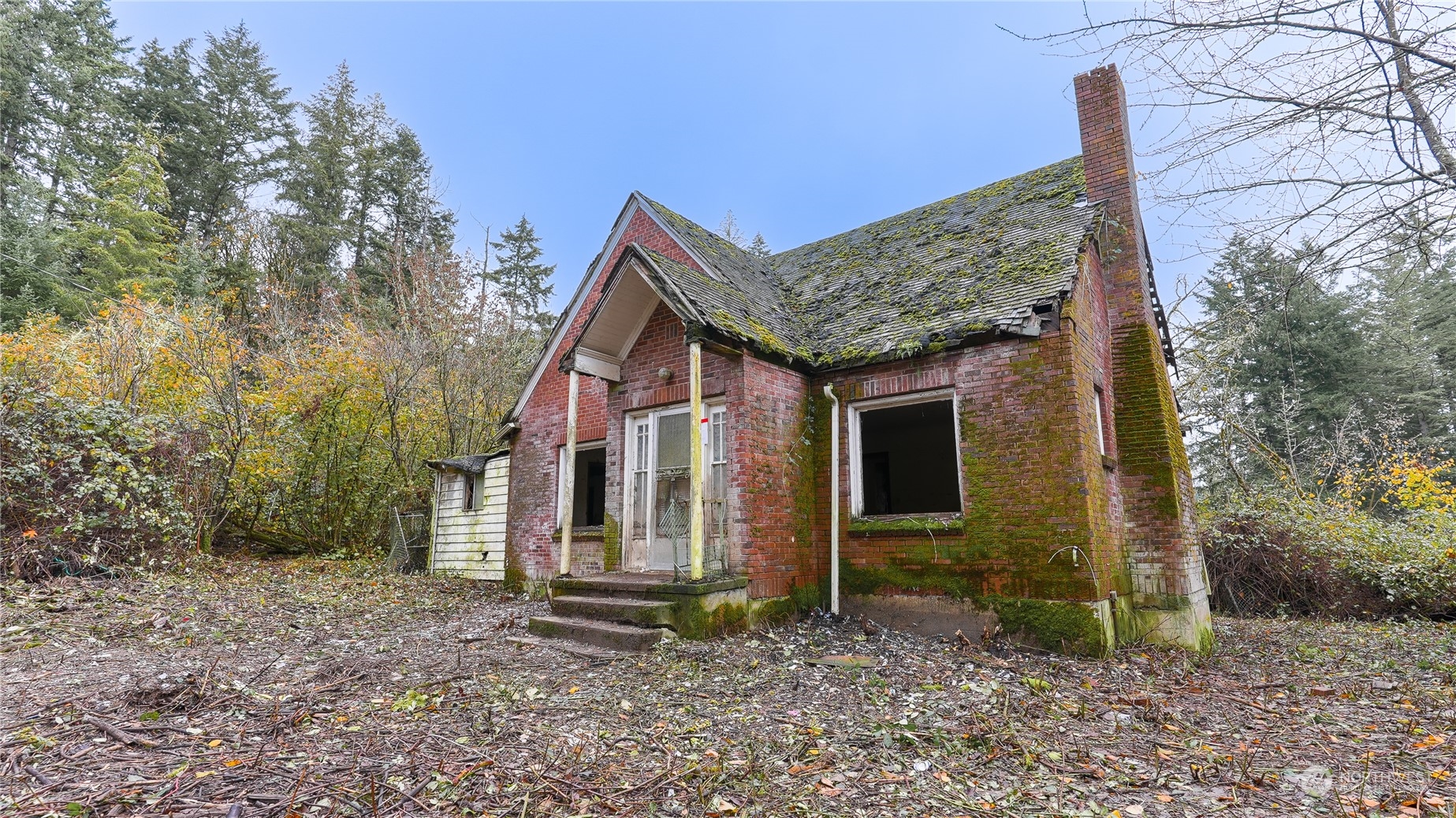 3715 Whiteman Road Southwest Longbranch, WA 98349 - Photo 6 of 26 a view of a house with backyard
