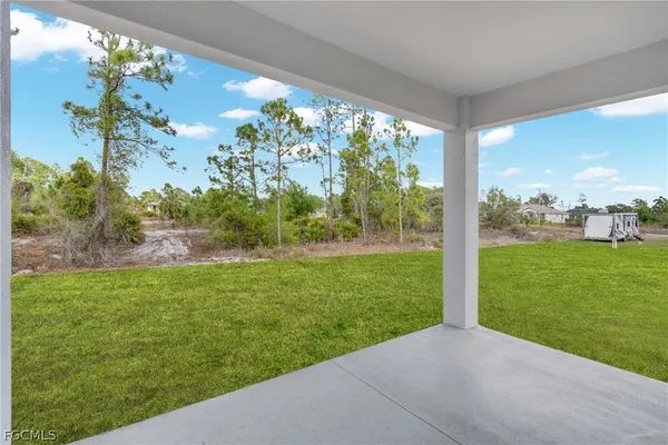 a view of a garden with an outdoor space