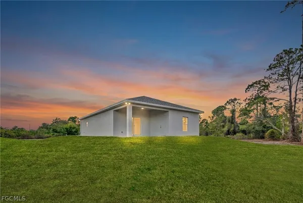a house view with a garden space