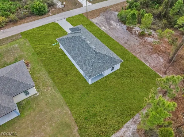 a view of a backyard with a garden