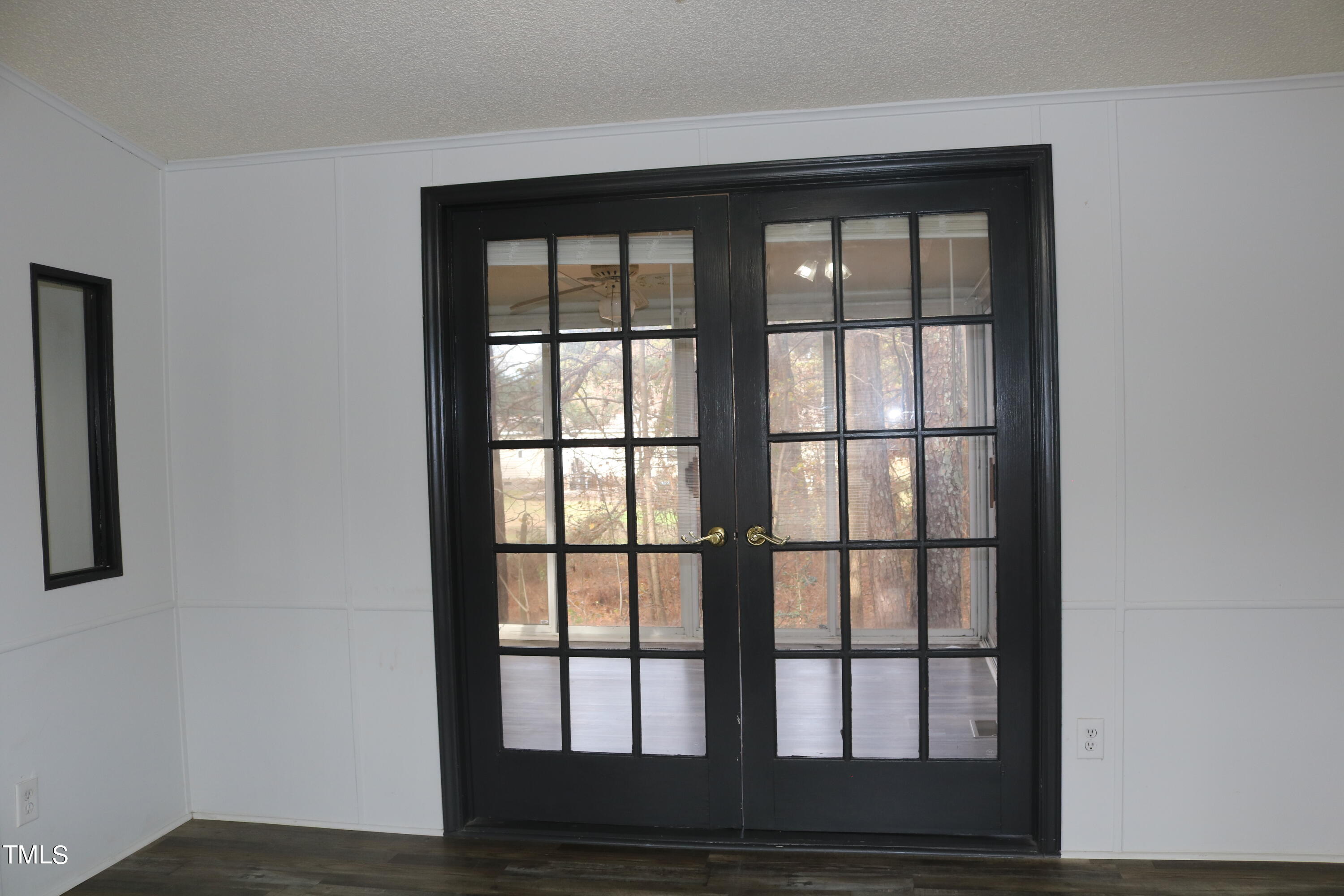 3537 Langston Road Raleigh, NC 27610 - Photo 10 of 21 a view of empty room with wooden floor