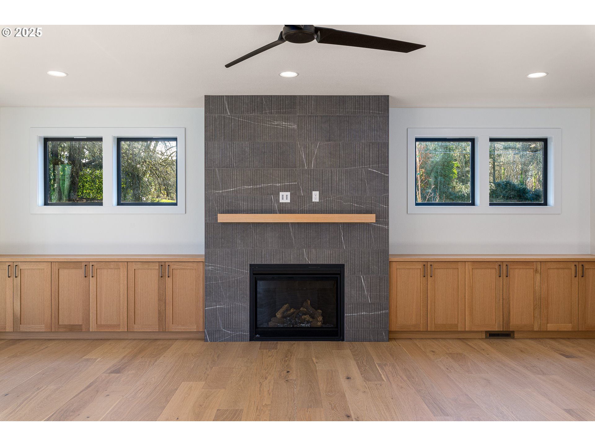 1855 Cloverleaf Road Lake Oswego, OR 97034 - Photo 15 of 34 a living room with a fireplace