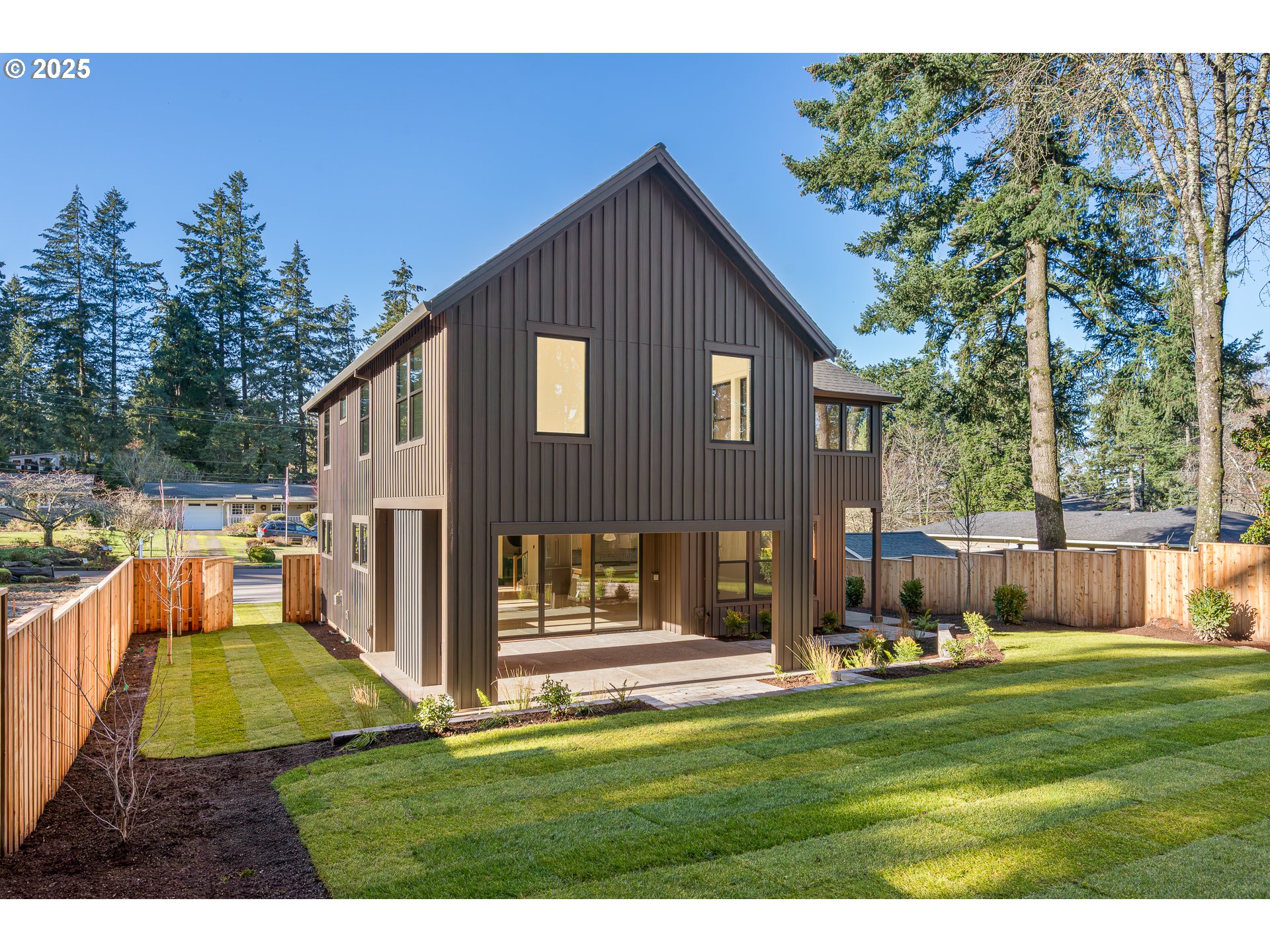 1855 Cloverleaf Road Lake Oswego, OR 97034 - Photo 2 of 34 a view of a house with a yard