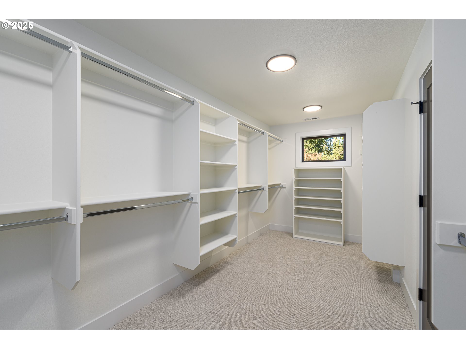 1855 Cloverleaf Road Lake Oswego, OR 97034 - Photo 26 of 34 a view of walk in closet with empty racks