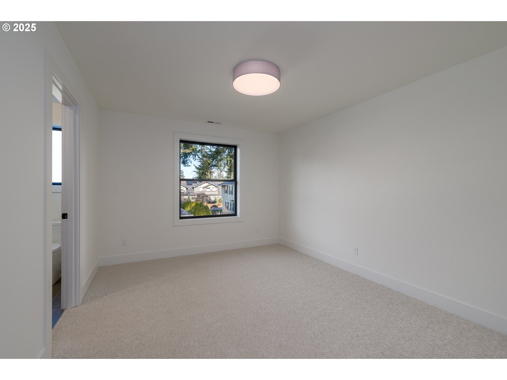 1855 Cloverleaf Road Lake Oswego, OR 97034 - Photo 29 of 34 a view of an empty room with a window