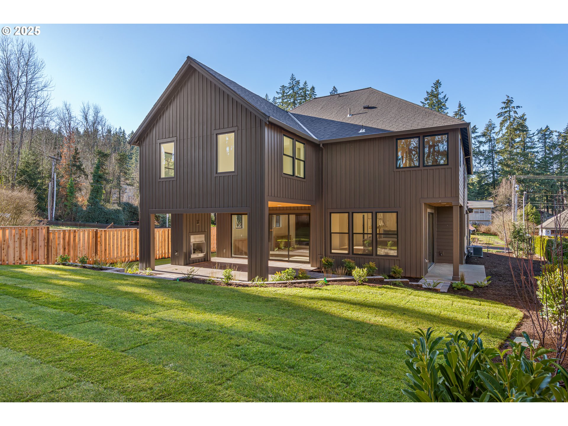 1855 Cloverleaf Road Lake Oswego, OR 97034 - Photo 3 of 34 a front view of a house with a yard