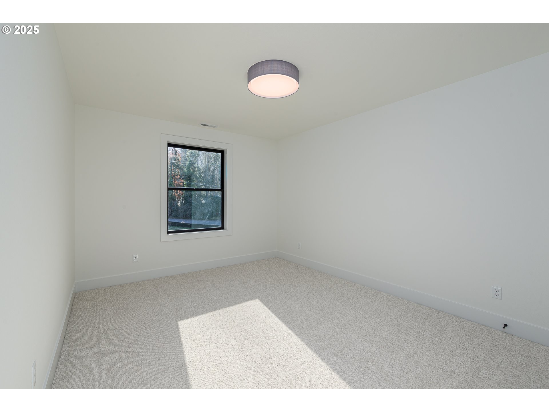 1855 Cloverleaf Road Lake Oswego, OR 97034 - Photo 32 of 34 a view of an empty room with a window