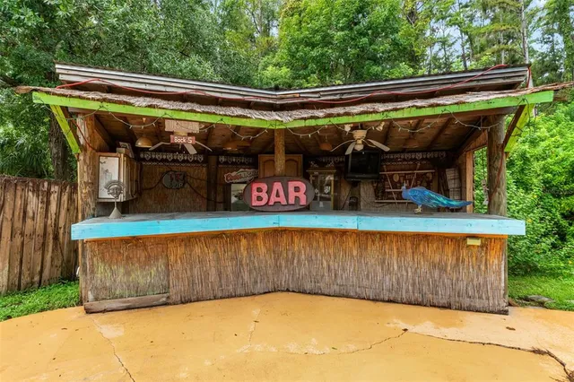 an aerial view of a house with a garden