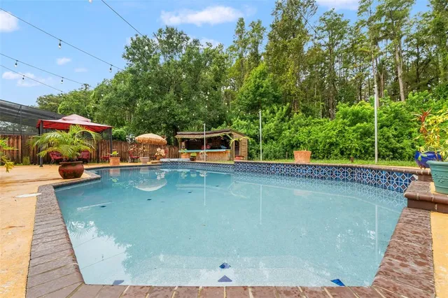 $575,000 | 16502 East Course Drive, Tampa, FL 33624