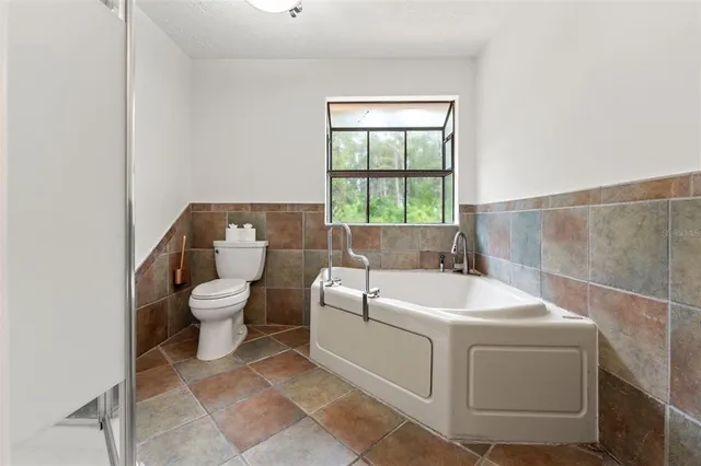 $575,000 | 16502 East Course Drive, Tampa, FL 33624