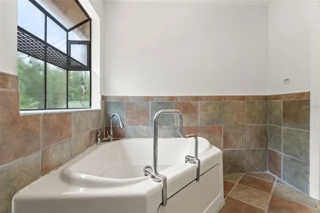 $575,000 | 16502 East Course Drive, Tampa, FL 33624