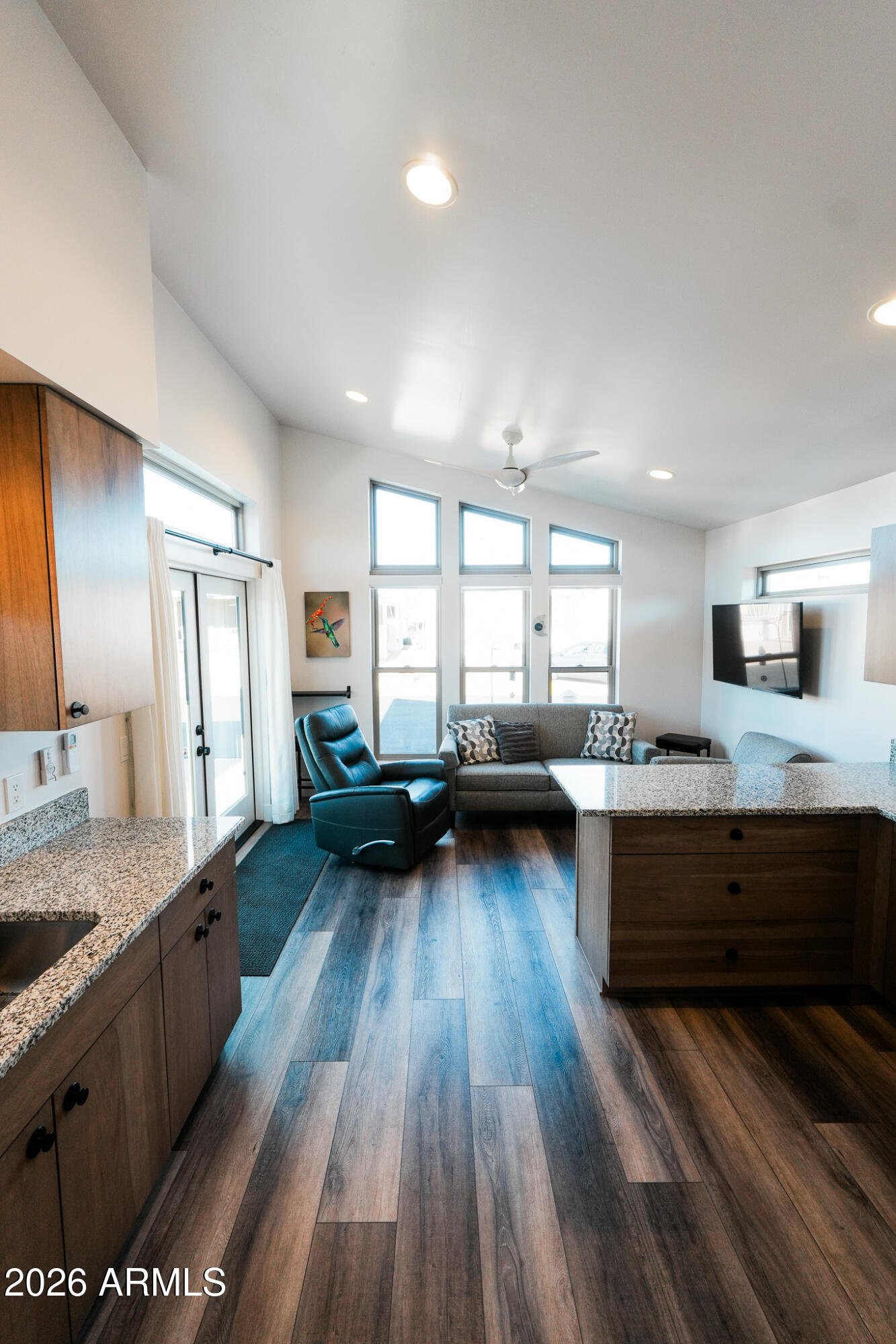 17200 West Bell Road, Unit 554 Surprise, AZ 85374 - Photo 12 of 21 a kitchen with sink refrigerator and stove