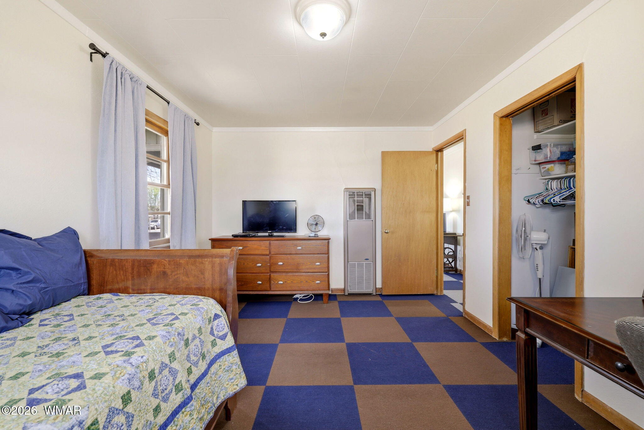 438 East Yaqui Street Springerville, AZ 85938 - Photo 18 of 31 a bedroom with a bed and a view of bathroom