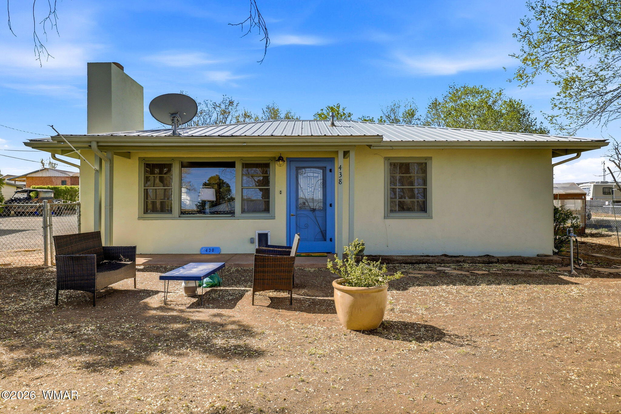 438 East Yaqui Street Springerville, AZ 85938 - Photo 2 of 31 a view of a lounge chair in the patio