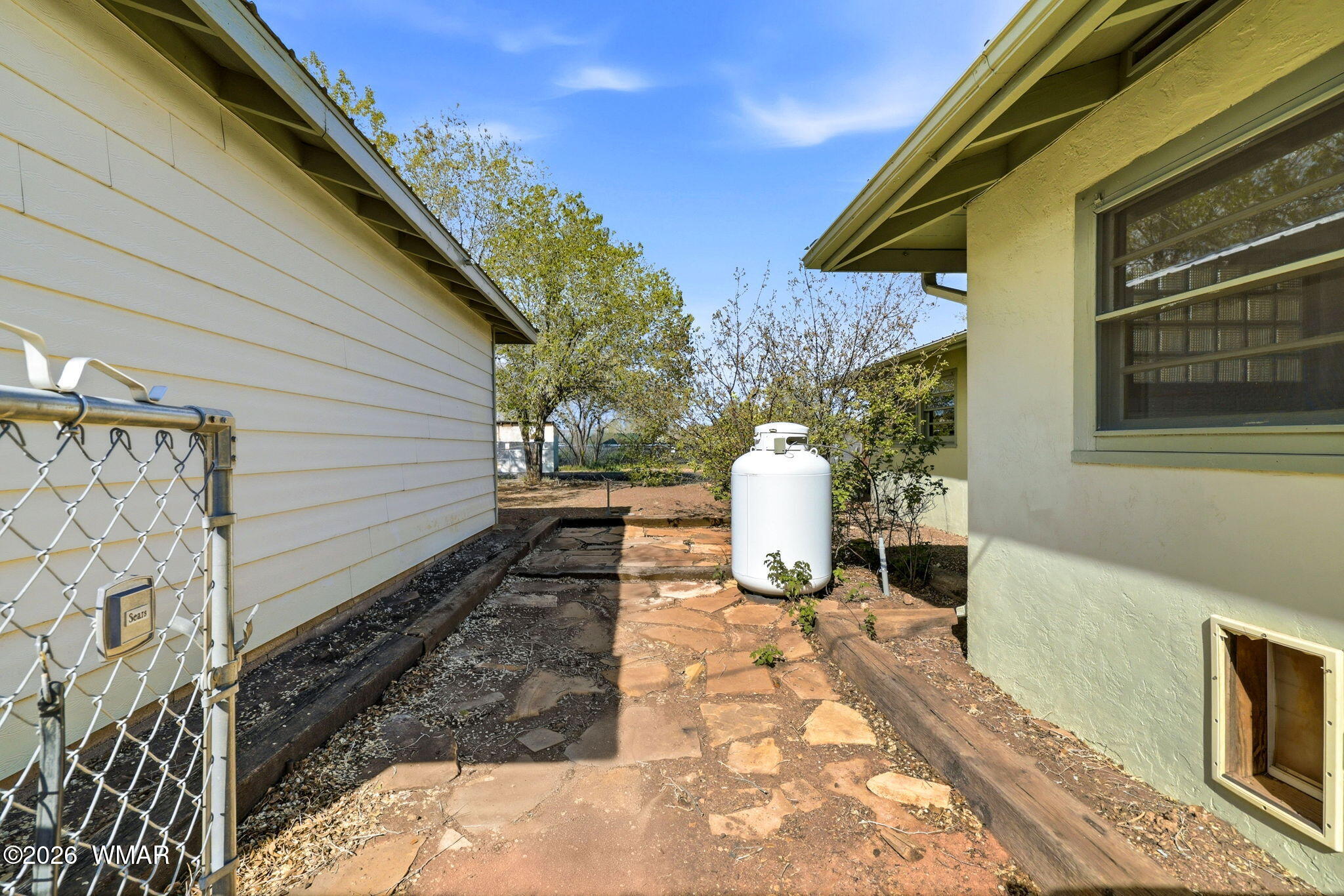 438 East Yaqui Street Springerville, AZ 85938 - Photo 23 of 31 a view of a back yard of the house