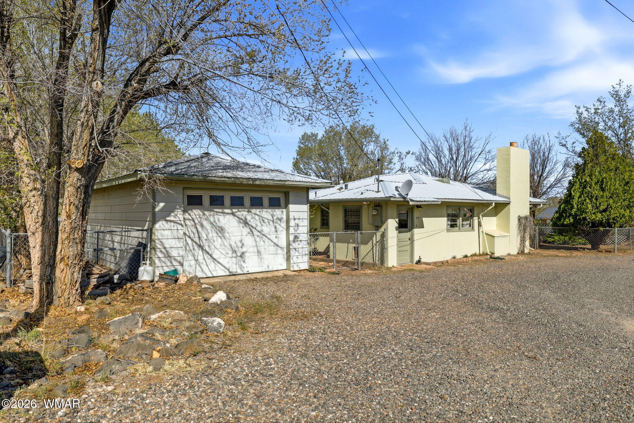 438 East Yaqui Street Springerville, AZ 85938 - Photo 24 of 31 a view of a house with a yard