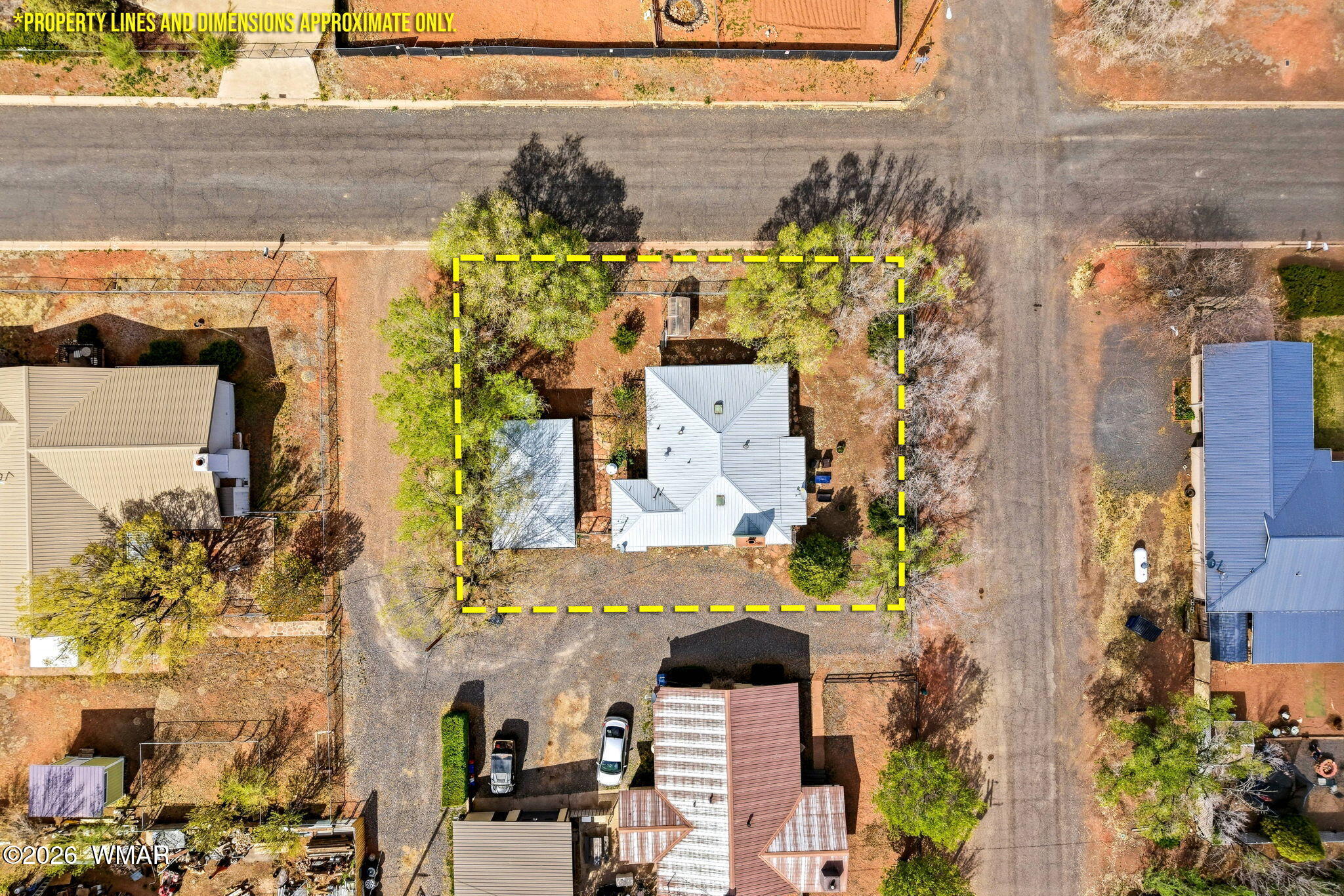 438 East Yaqui Street Springerville, AZ 85938 - Photo 25 of 31 front view of a houses with a street