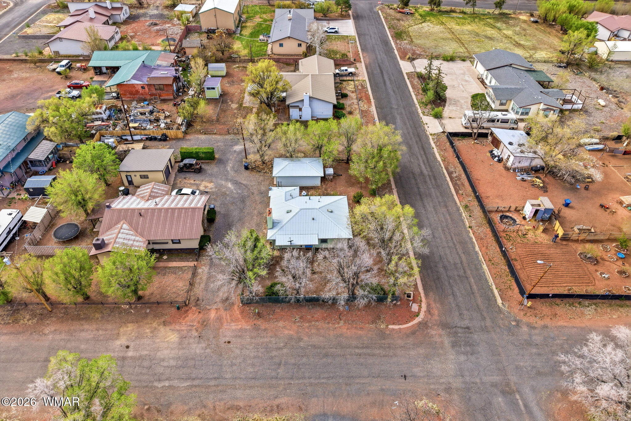 438 East Yaqui Street Springerville, AZ 85938 - Photo 27 of 31 an aerial view of residential houses with outdoor space