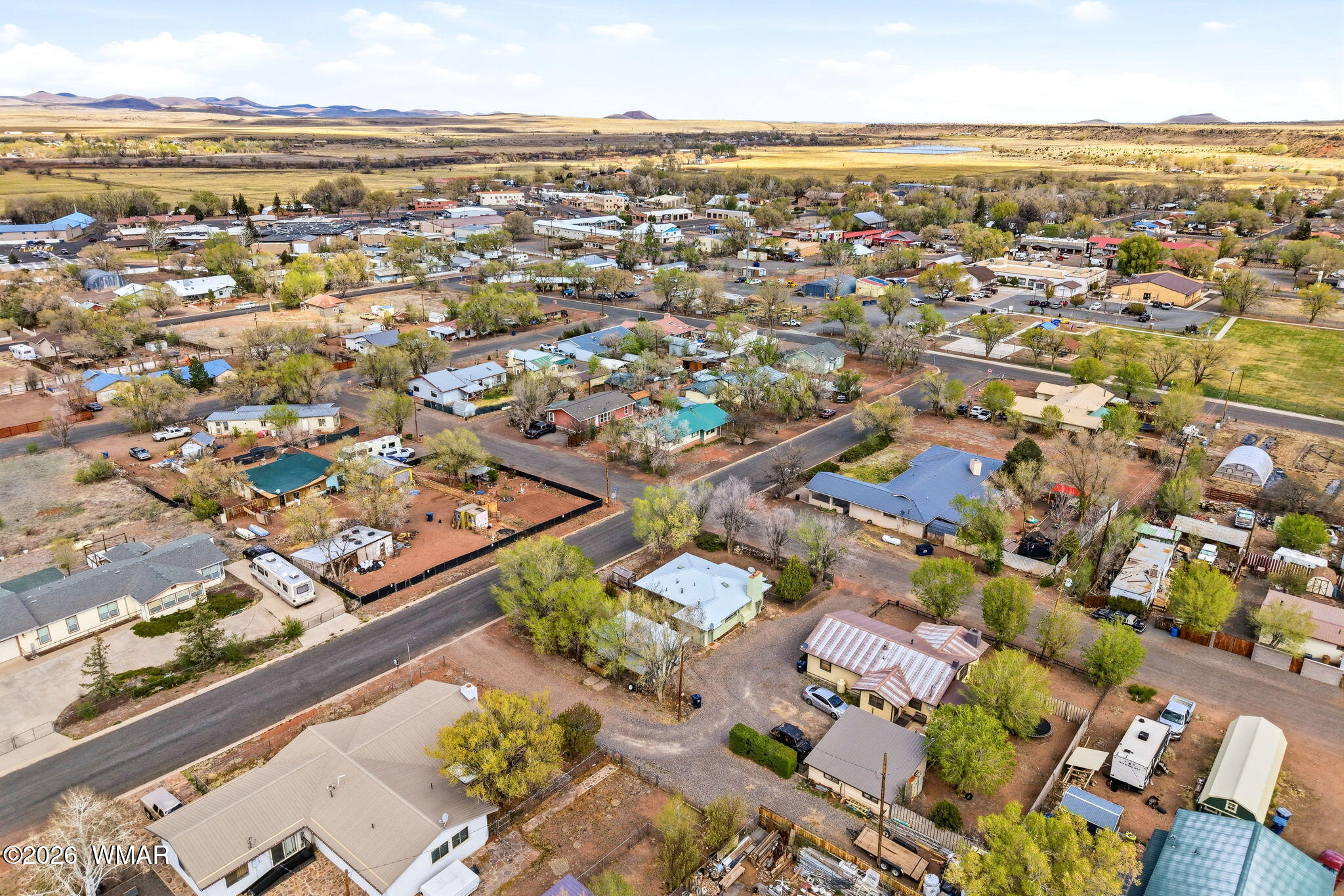 438 East Yaqui Street Springerville, AZ 85938 - Photo 29 of 31 an aerial view of residential building with parking space