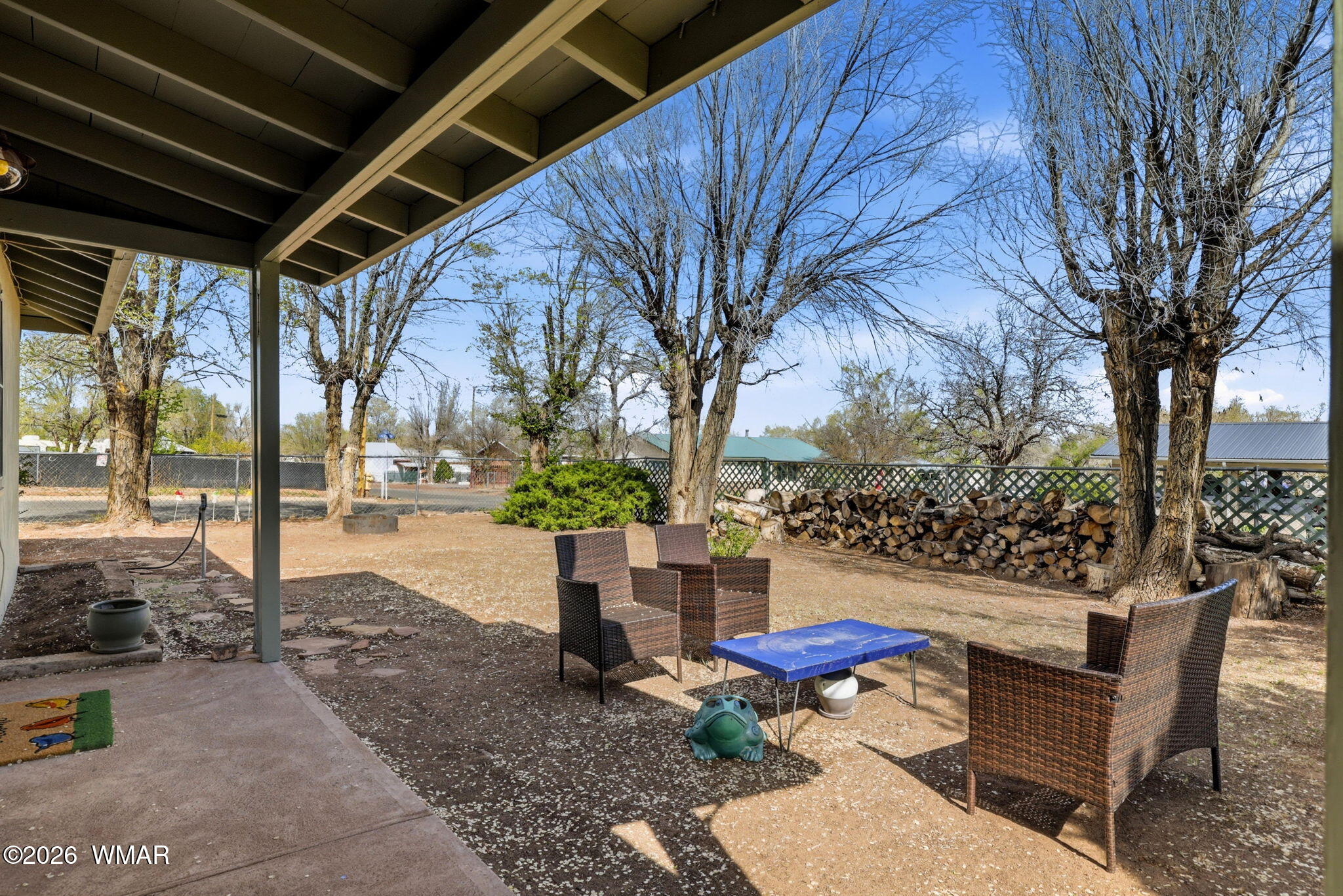 438 East Yaqui Street Springerville, AZ 85938 - Photo 5 of 31 a outdoor space with patio lots of furniture and a fire pit