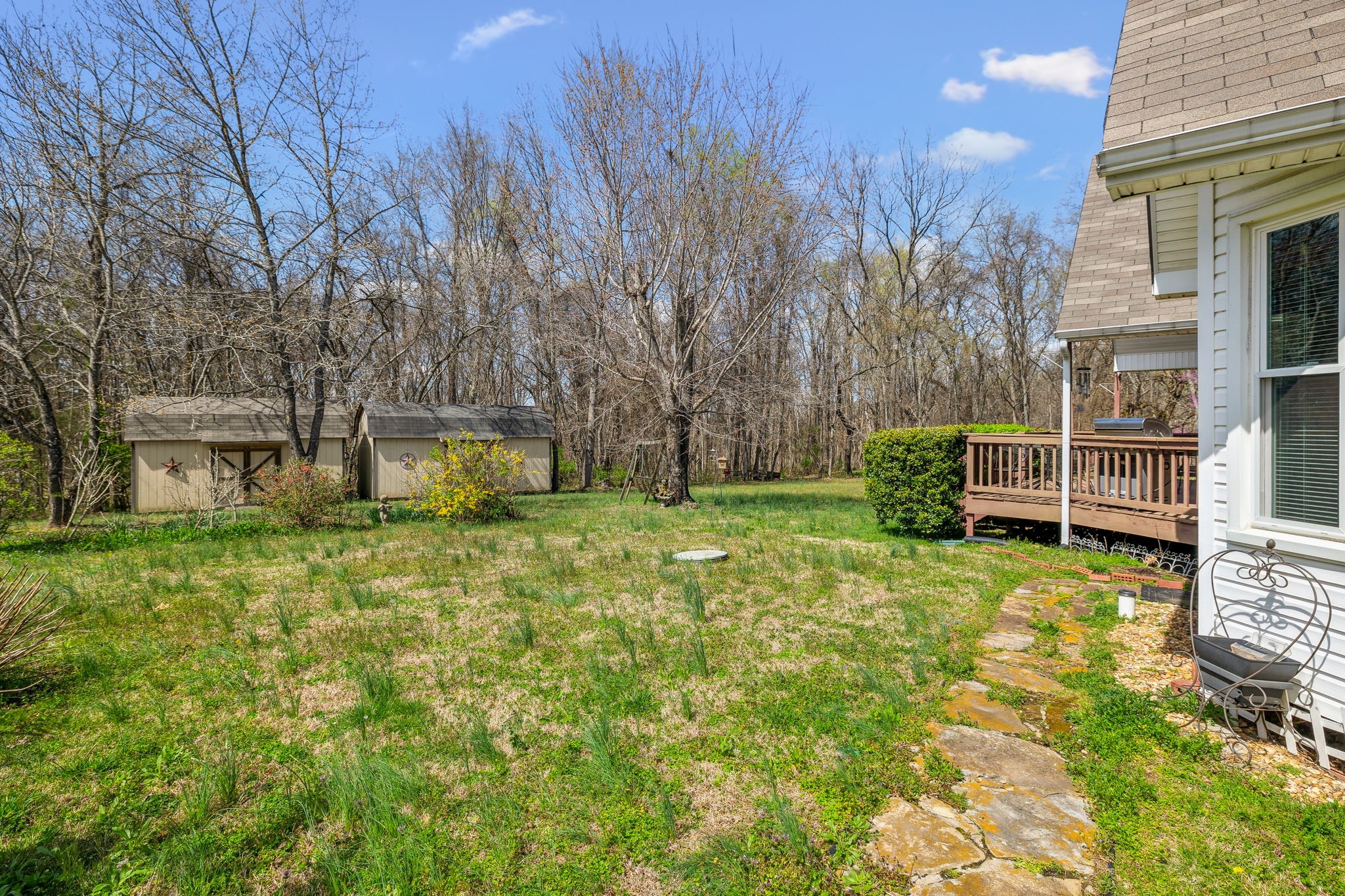 204 Beckwith Road Mount Juliet, TN 37122 - Photo 56 of 61 a yellow house with trees in front of it