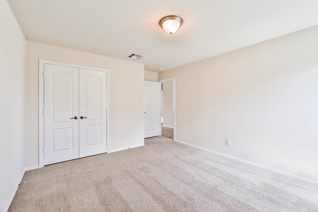 247 Sintra Lk Way Rosenberg, TX 77469 - Photo 22 of 28 a view of an empty room