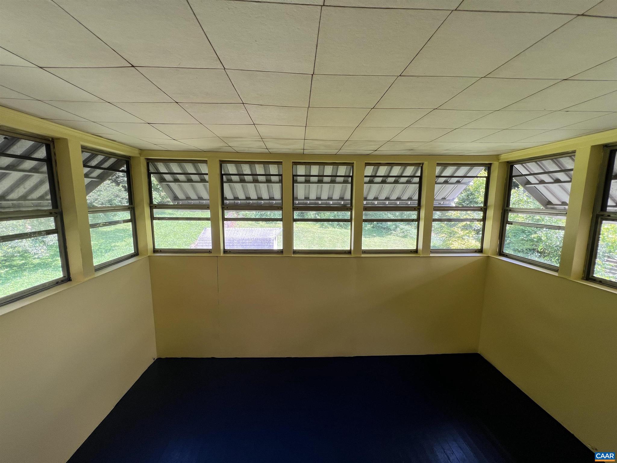 1320 Avon Street Charlottesville, VA 22902 - Photo 13 of 40 a view of an empty room with a window