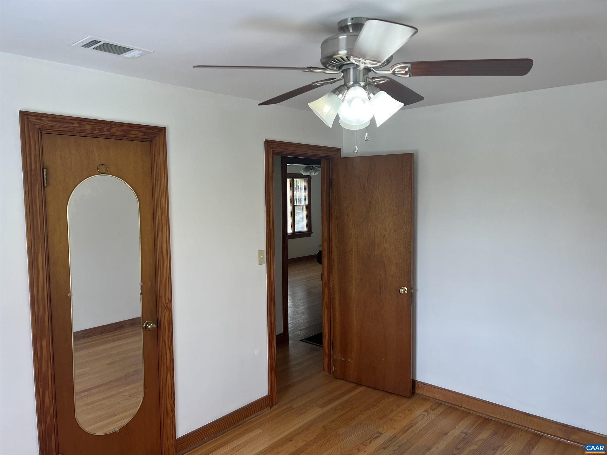 1320 Avon Street Charlottesville, VA 22902 - Photo 15 of 40 a view of a livingroom with a chandelier fan
