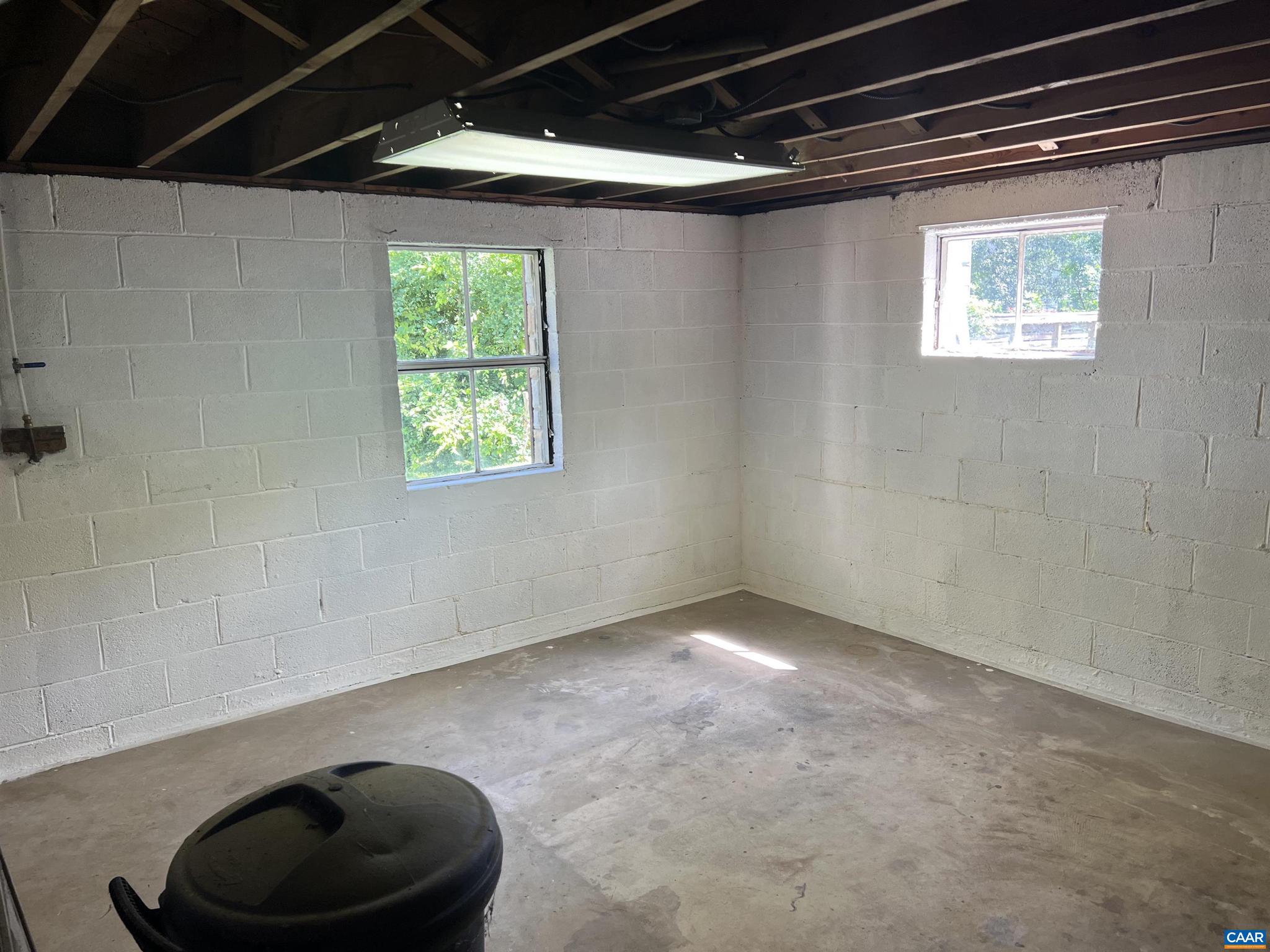1320 Avon Street Charlottesville, VA 22902 - Photo 23 of 40 a view of an empty room with a window