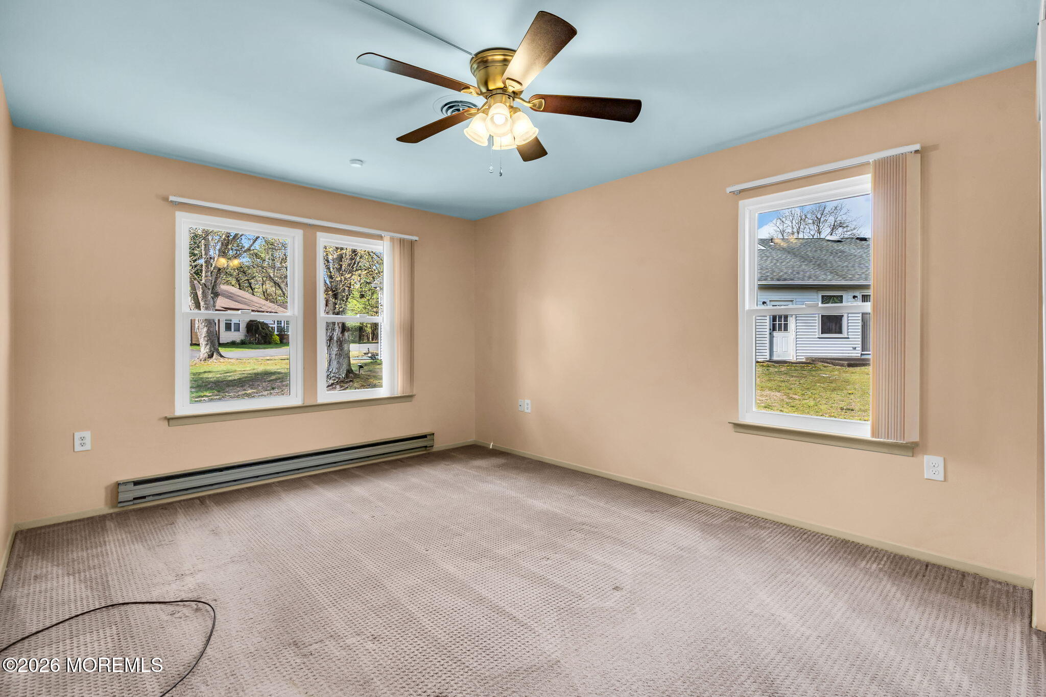 20B Amesbury Road, Unit B Whiting, NJ 08759 - Photo 11 of 25 a view of an empty room with window and cabinet