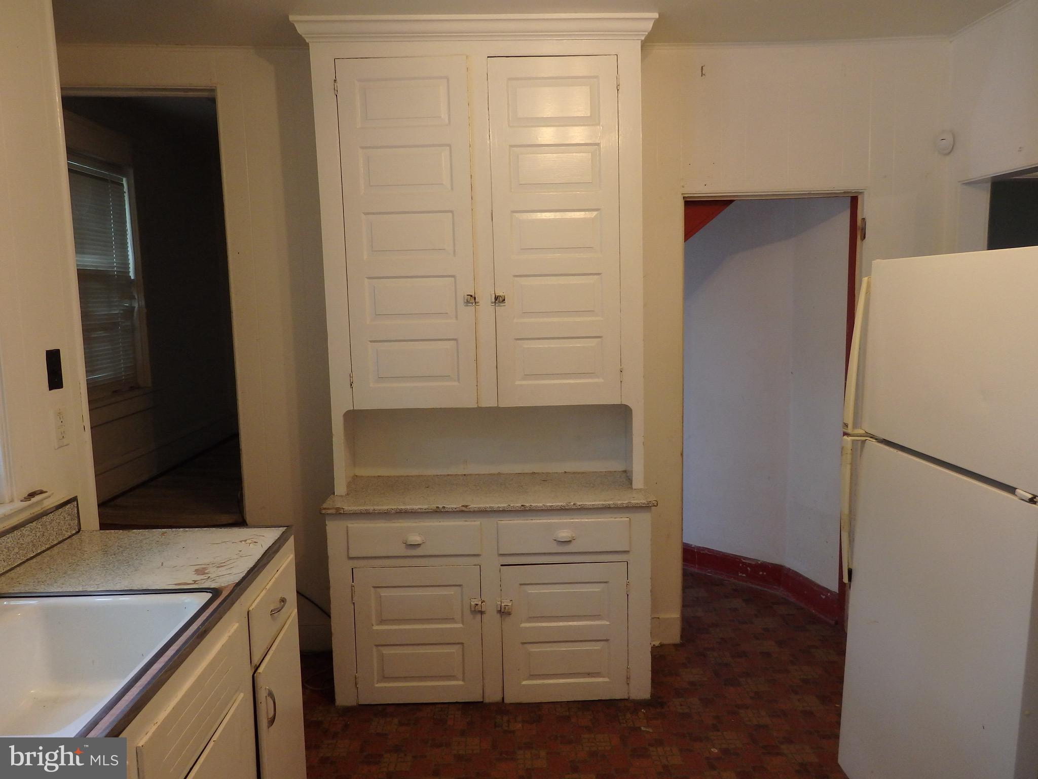 2918 Haverford Road Ardmore, PA 19003 - Photo 13 of 26 Kitchen with back stairs & wall pantry