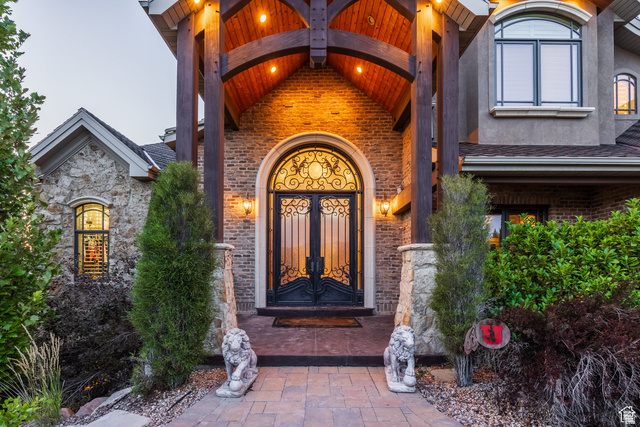 694 West Cephus Road Draper, UT 84020 - Photo 9 of 148 Grand arched entry featuring intricate wrought iron double doors