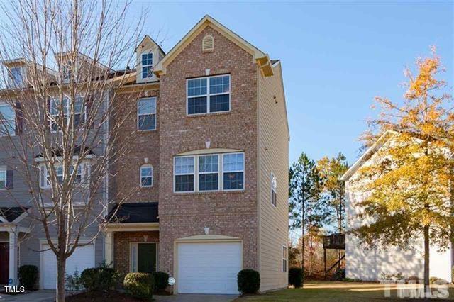 200 Presenteer Trail Apex, NC 27539 - Photo 1 of 17 a front view of a house with a yard