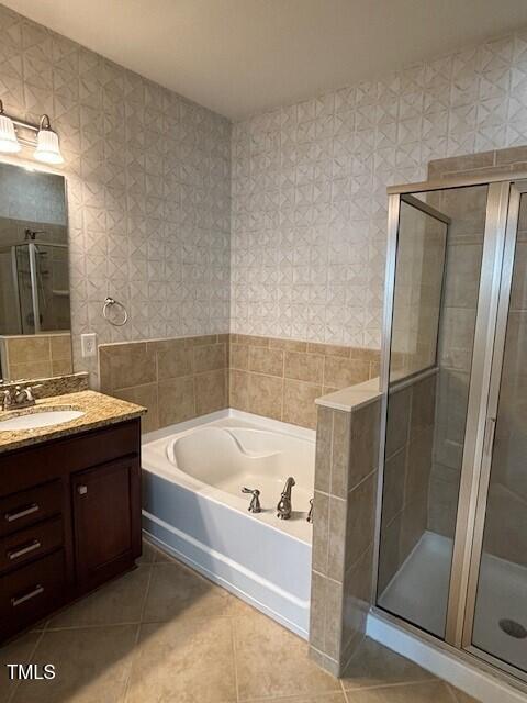 200 Presenteer Trail Apex, NC 27539 - Photo 11 of 17 a bathroom with a bathtub and a sink