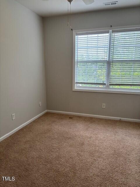 200 Presenteer Trail Apex, NC 27539 - Photo 14 of 17 an empty room with a window