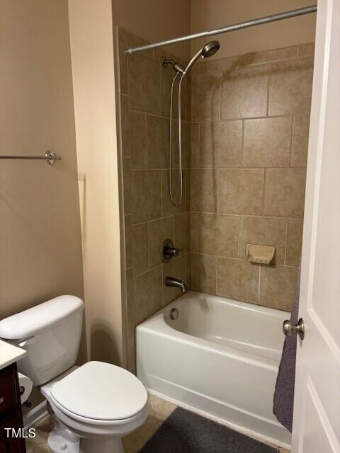 200 Presenteer Trail Apex, NC 27539 - Photo 15 of 17 a bathroom with a toilet and a bath tub