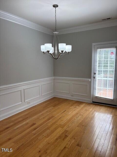 200 Presenteer Trail Apex, NC 27539 - Photo 4 of 17 a view of a livingroom with a window and wooden floor