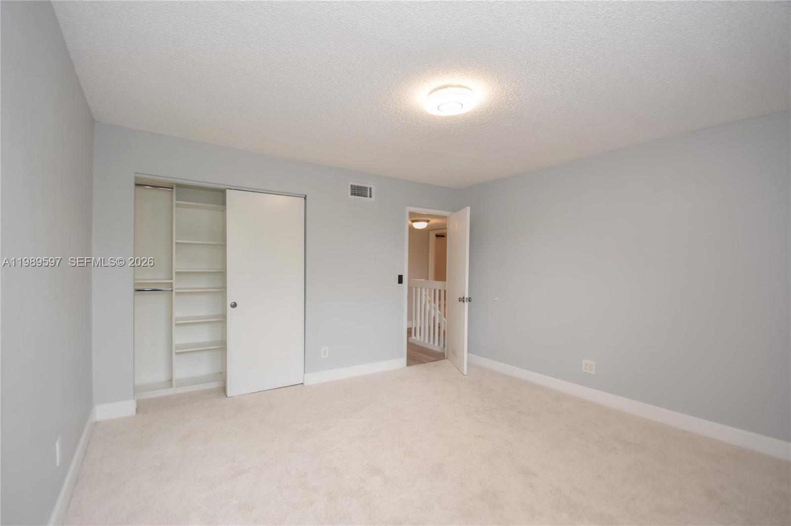 4801 Grapevine Way, Unit 4801 Davie, FL 33331 - Photo 20 of 32 a view of an empty room and closet area