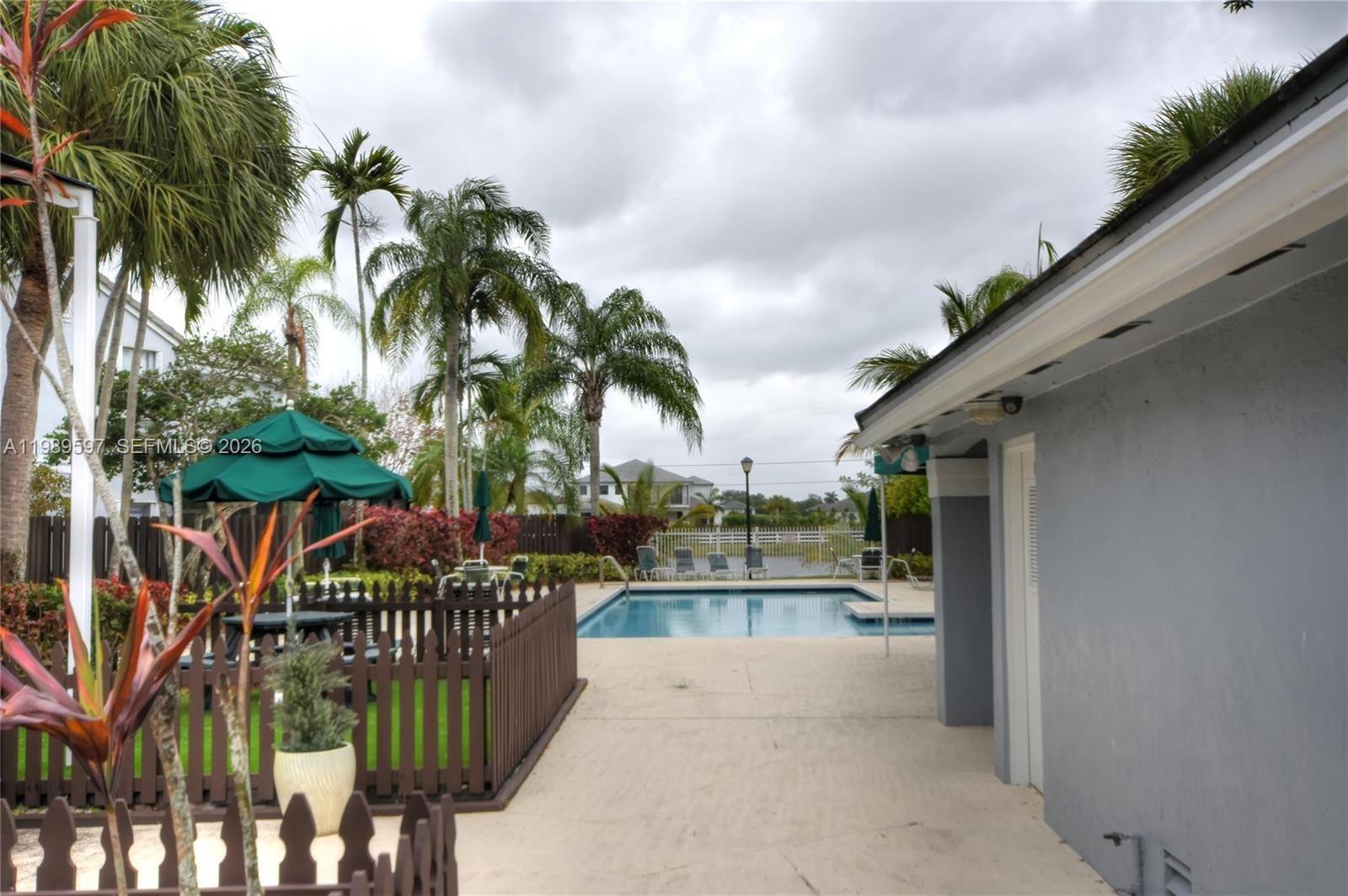 4801 Grapevine Way, Unit 4801 Davie, FL 33331 - Photo 31 of 32 a view of balcony with small garden