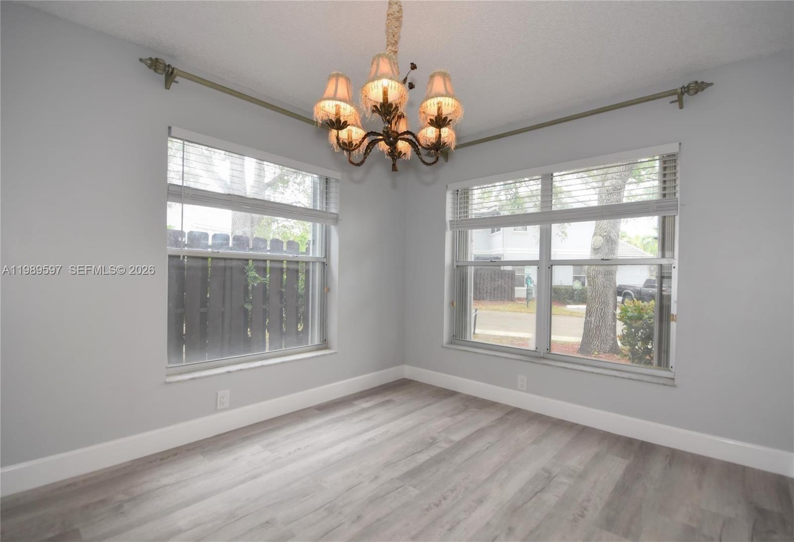 4801 Grapevine Way, Unit 4801 Davie, FL 33331 - Photo 8 of 32 a view of an empty room with a window