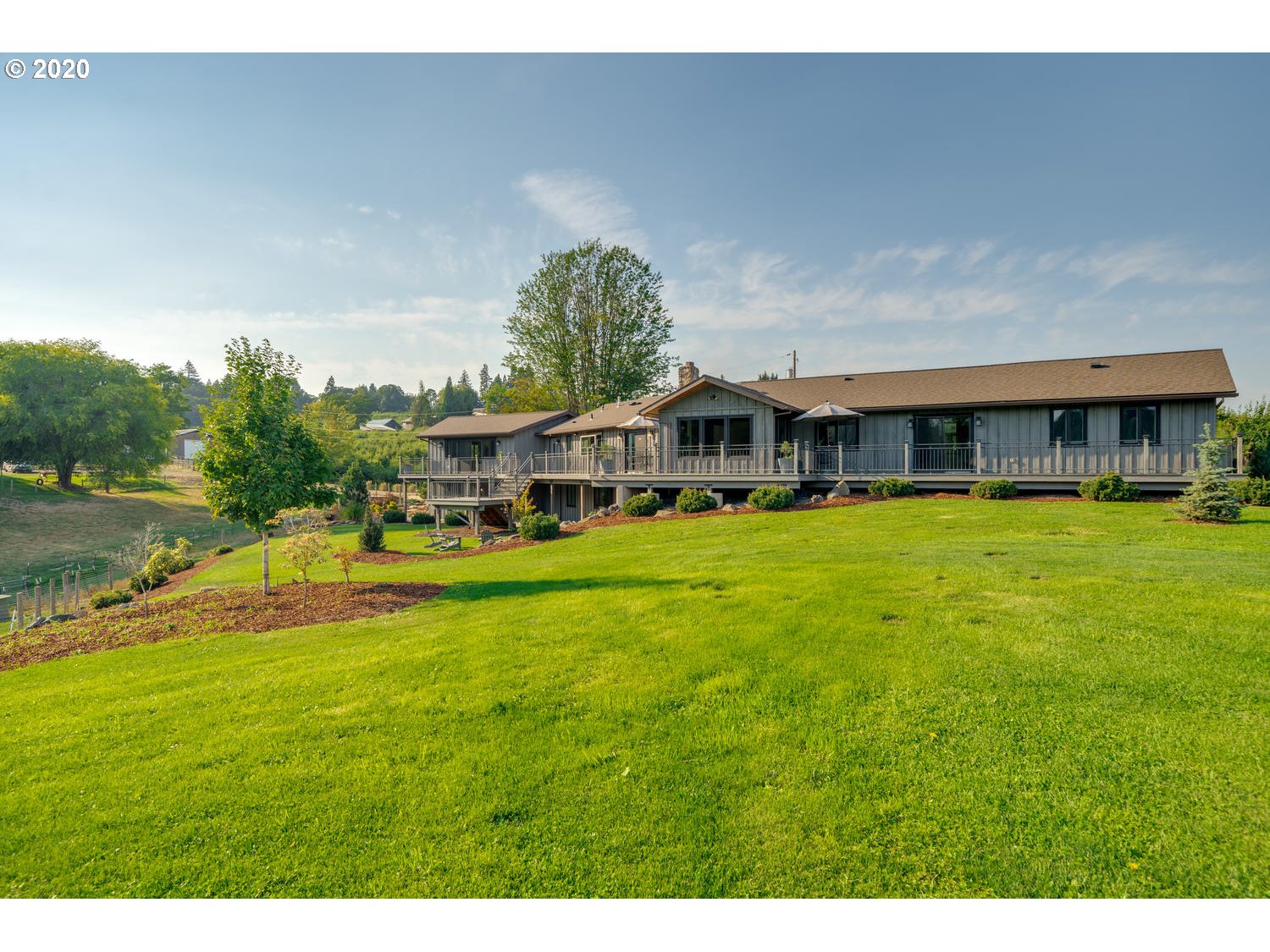 2133 Tucker Road Hood River, OR 97031 - Photo 5 of 32 a view of a house with swimming pool and yard