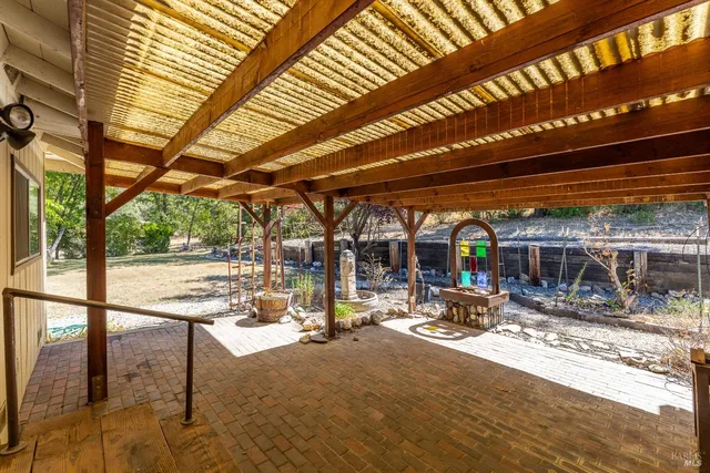 a view of a swimming pool with a patio