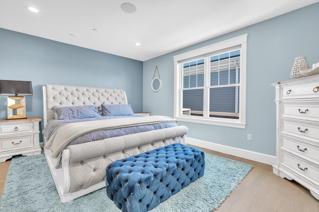 199 West 8th Street, Unit 6 Boston, MA 02127 - Photo 14 of 28 a bedroom with a bed and a window