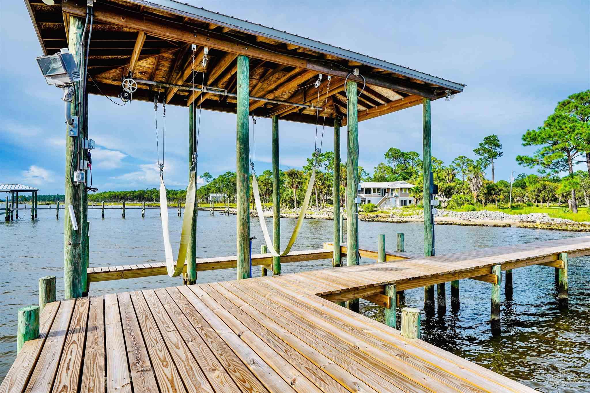 1131 Pearson Road Milton, FL 32583 - Photo 26 of 33 Includes a Boat Lift