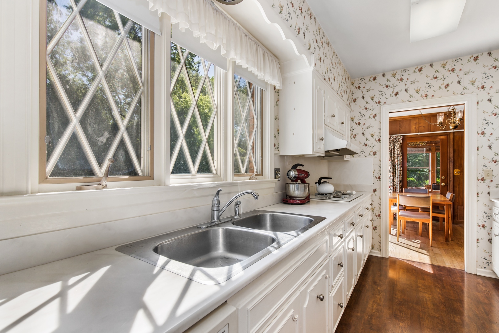 222 Summerfield Road Northbrook, IL 60062 - Photo 3 of 23 a kitchen with a sink and a window